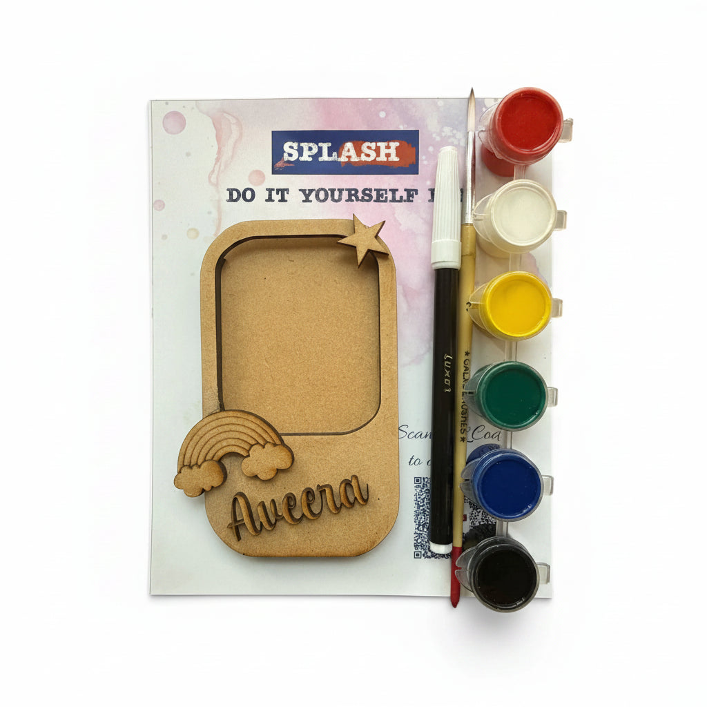DIY photo frame craft kit with a wooden frame, acrylic paint pots in red, white, yellow, green, blue, and black, a paintbrush, and a printed instruction sheet on a white background.