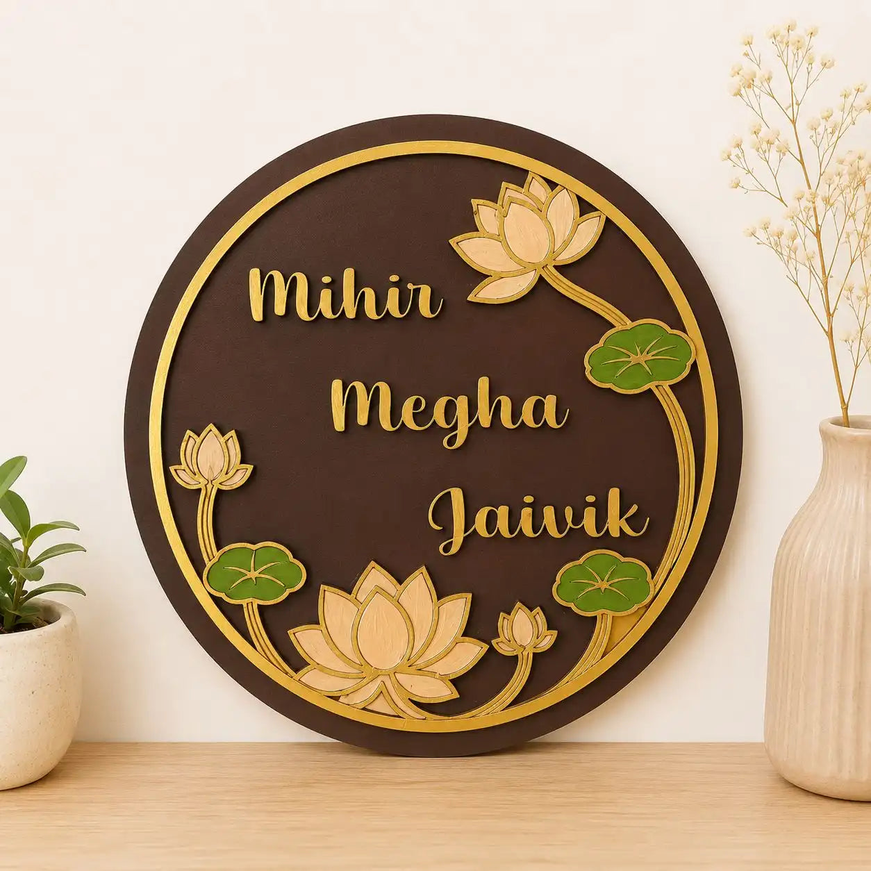 Decorative wall plaque with lotus designs and text on a wooden surface.